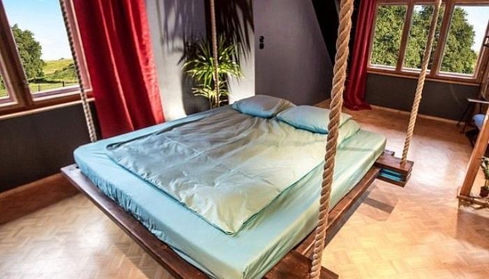 Teal Game Room With Hanging Beds